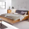 Wildholz Bett Housten mit Bügelgestell aus Metall