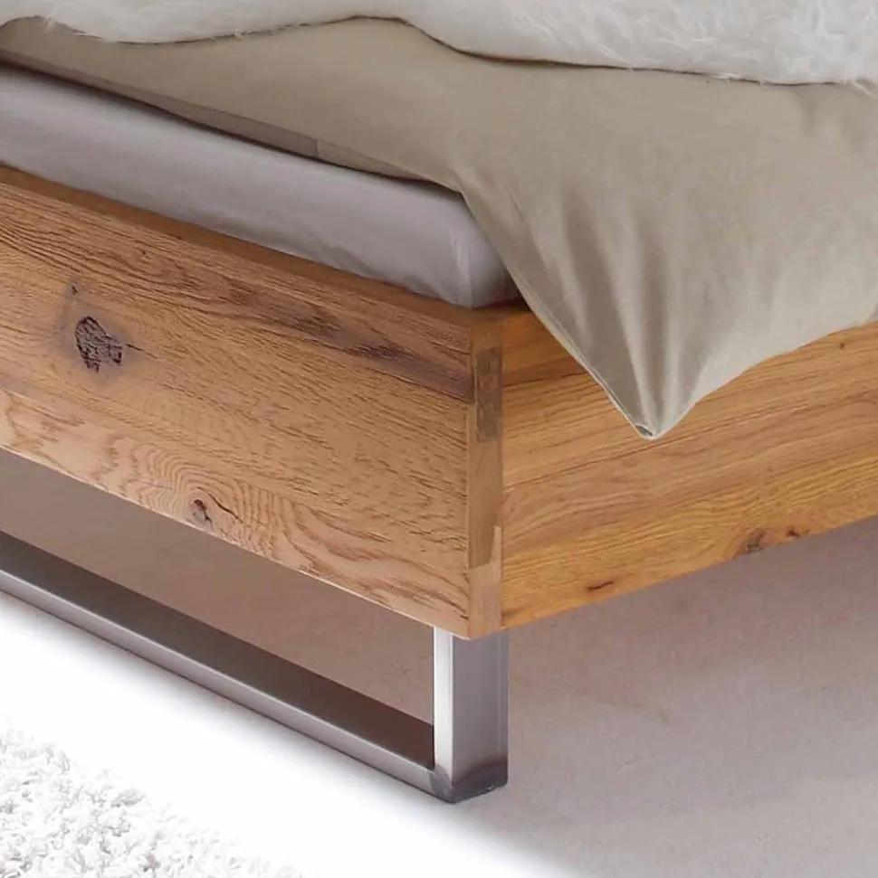 Wildholz Bett Housten mit Bügelgestell aus Metall